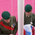 Members of the armed services ready to raise the Russian flag